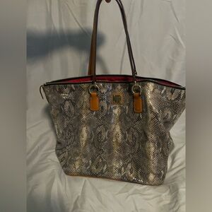 Dooney & Burke Tote. Black. And brown snake skin print.